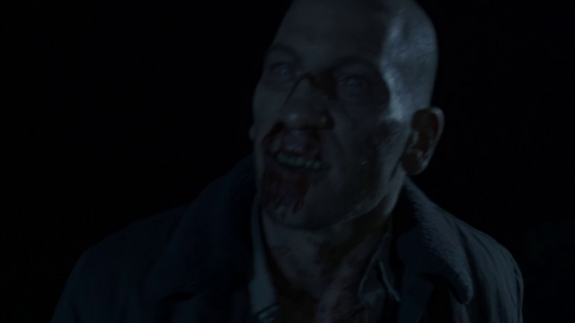 File:ShaneWalshZombieStrangeSmile.png