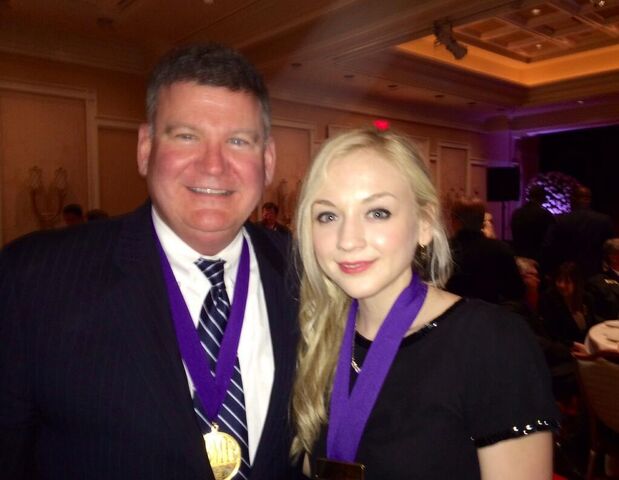 File:Emily with a medal with an old man.jpg