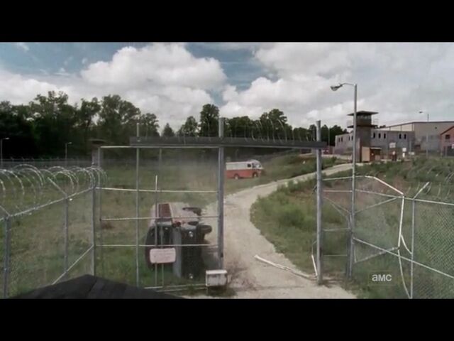 File:Prison fence wreck.jpg