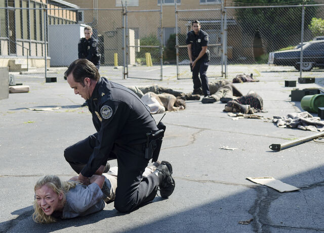 File:Officers arrest beth.jpg