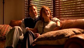 Fox Mulder and Dana Scully as Rob Petrie and Laura Petrie