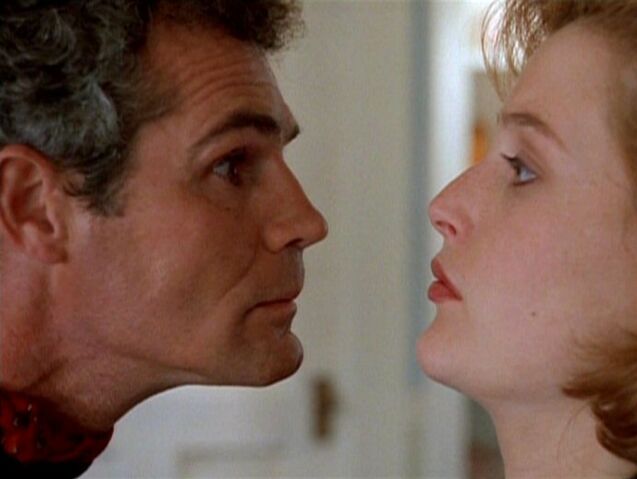 File:Yappi scrutinizes Dana Scully.jpg